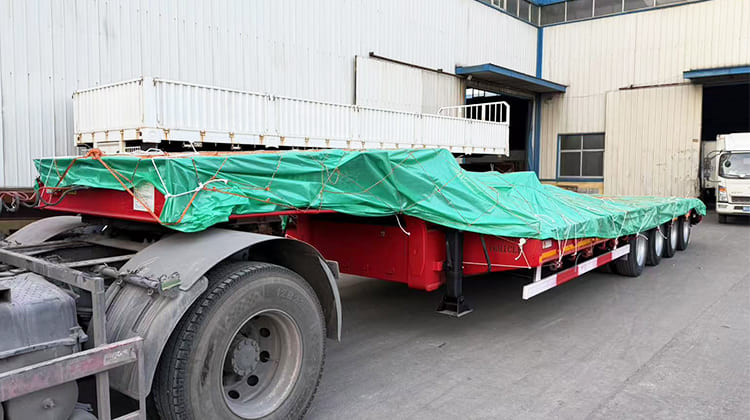 4 Axle 100 Ton Low Bed Semi Truck Trailer with Ramp for Sale in Tanzania