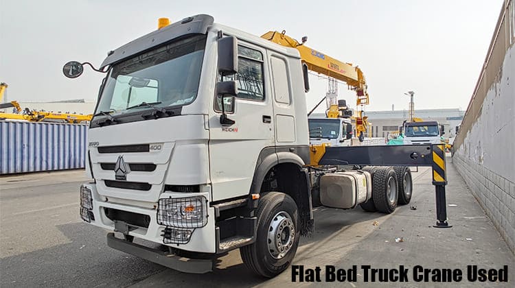 Sinotruk Howo 400 Flat Bed Truck Crane Used for Sale in Tanzania