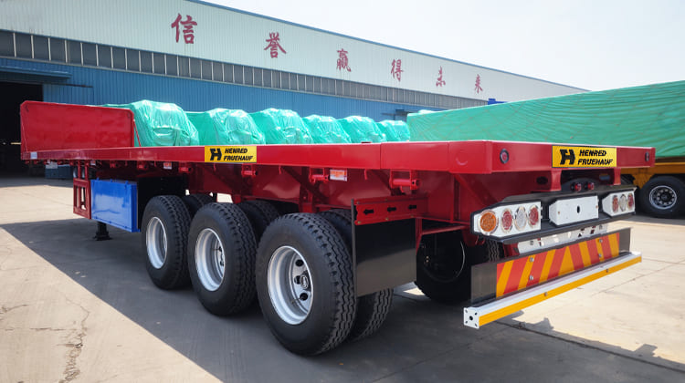 Henred Fruehauf Zambia Tri Axle Flatbed Trailer Prices for Sale 
