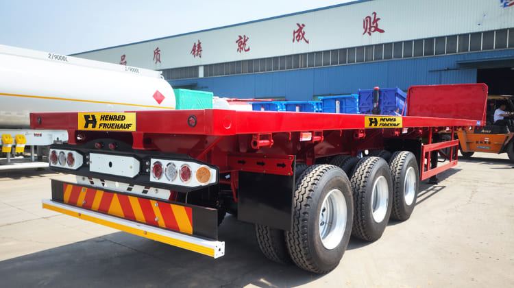 Henred Fruehauf Zambia Tri Axle Flatbed Trailer Prices for Sale 