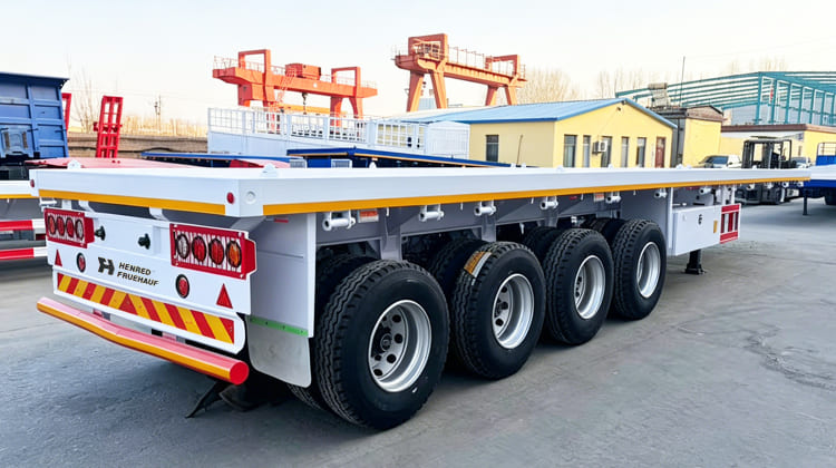 Henred Fruehauf 4 Axle Flatbed Semi Truck Trailer for Sales in Zambia